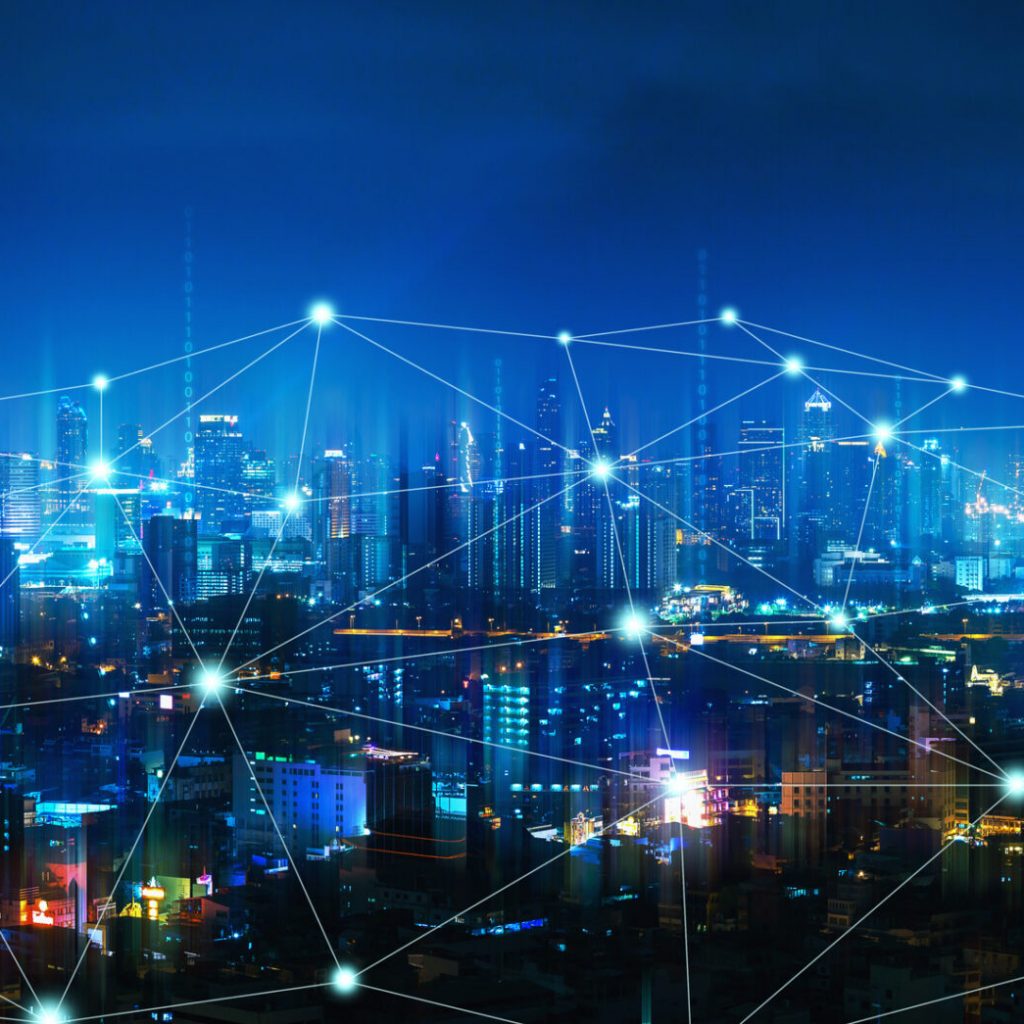 Wireless network and Connection technology concept with Bangkok city background at night in Thailand, panorama view
