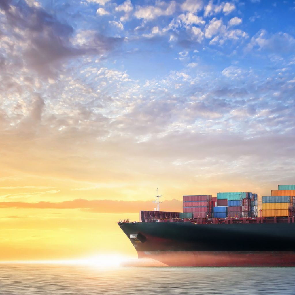 Container cargo ship in the ocean at sunset sky, Global business logistics import export background, Freight transportation, Shipping