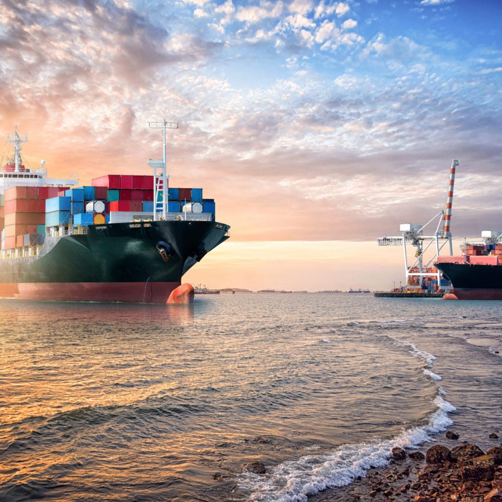 Logistics import export background of Container Cargo ship in the ocean st sunset sky, Freight Transportation